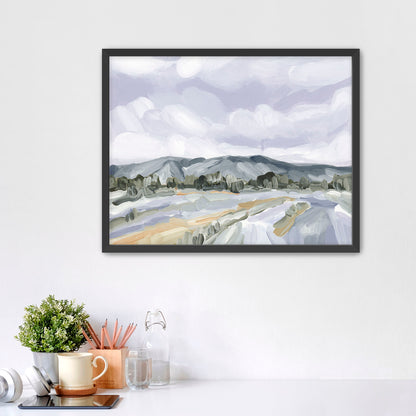 Framed landscape painting depicting mountains and fields in muted colors.