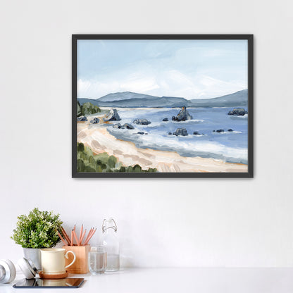 Framed painting of a coastal landscape with a beach, rocky shoreline, and distant mountains.