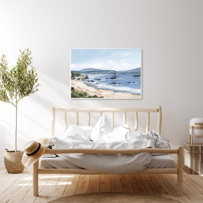 Wooden bed frame with white bedding and a coastal landscape painting above it.