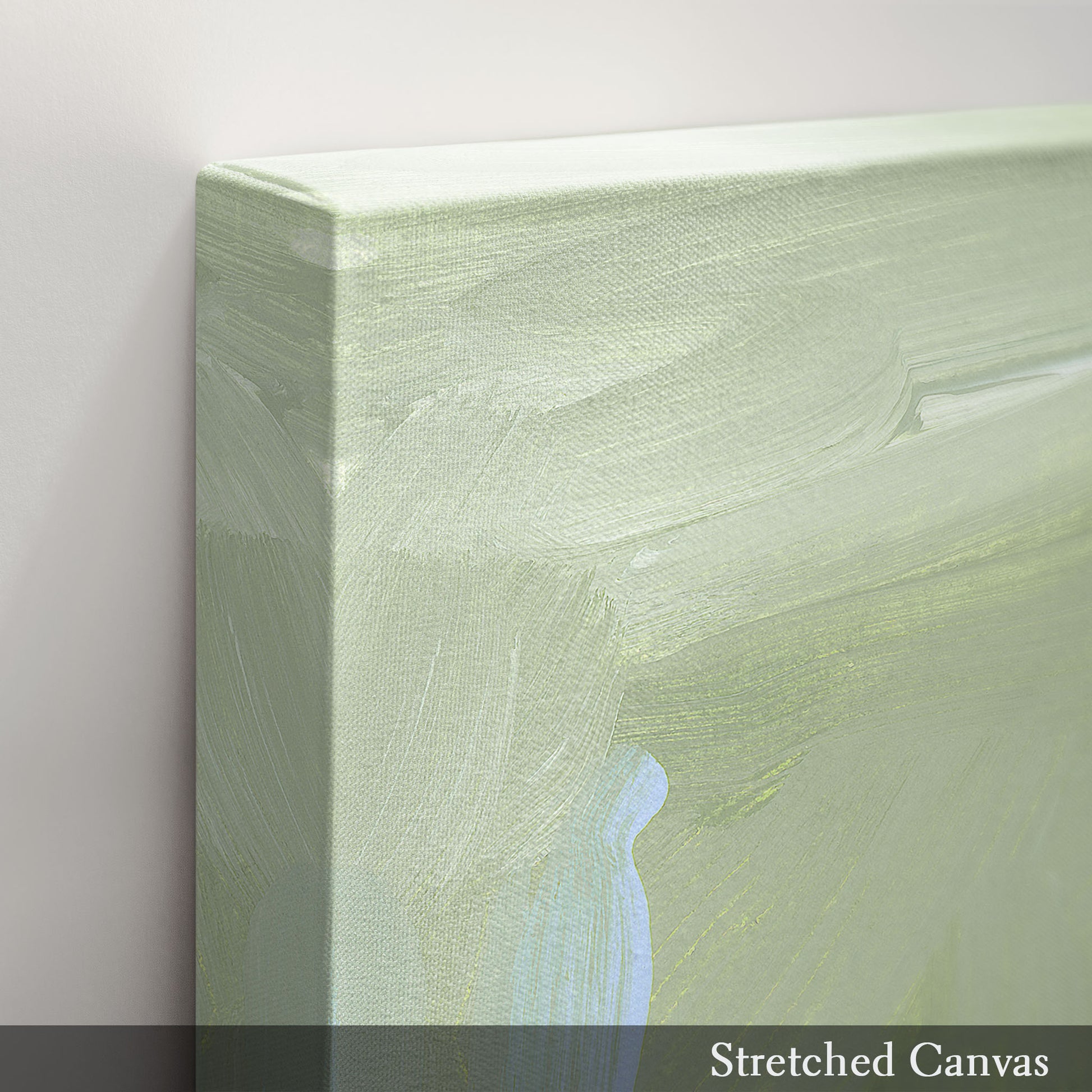 Stretched canvas with a pale green painted surface and a faint blue figure visible.