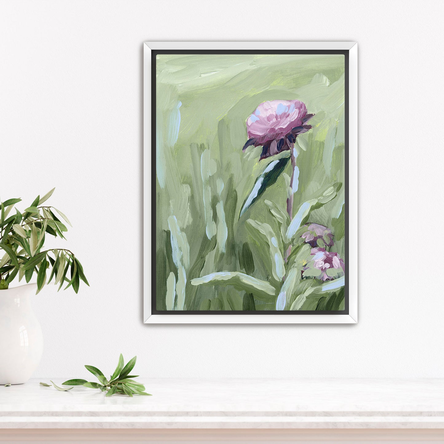 Framed painting of a pink peony flower against a green background.