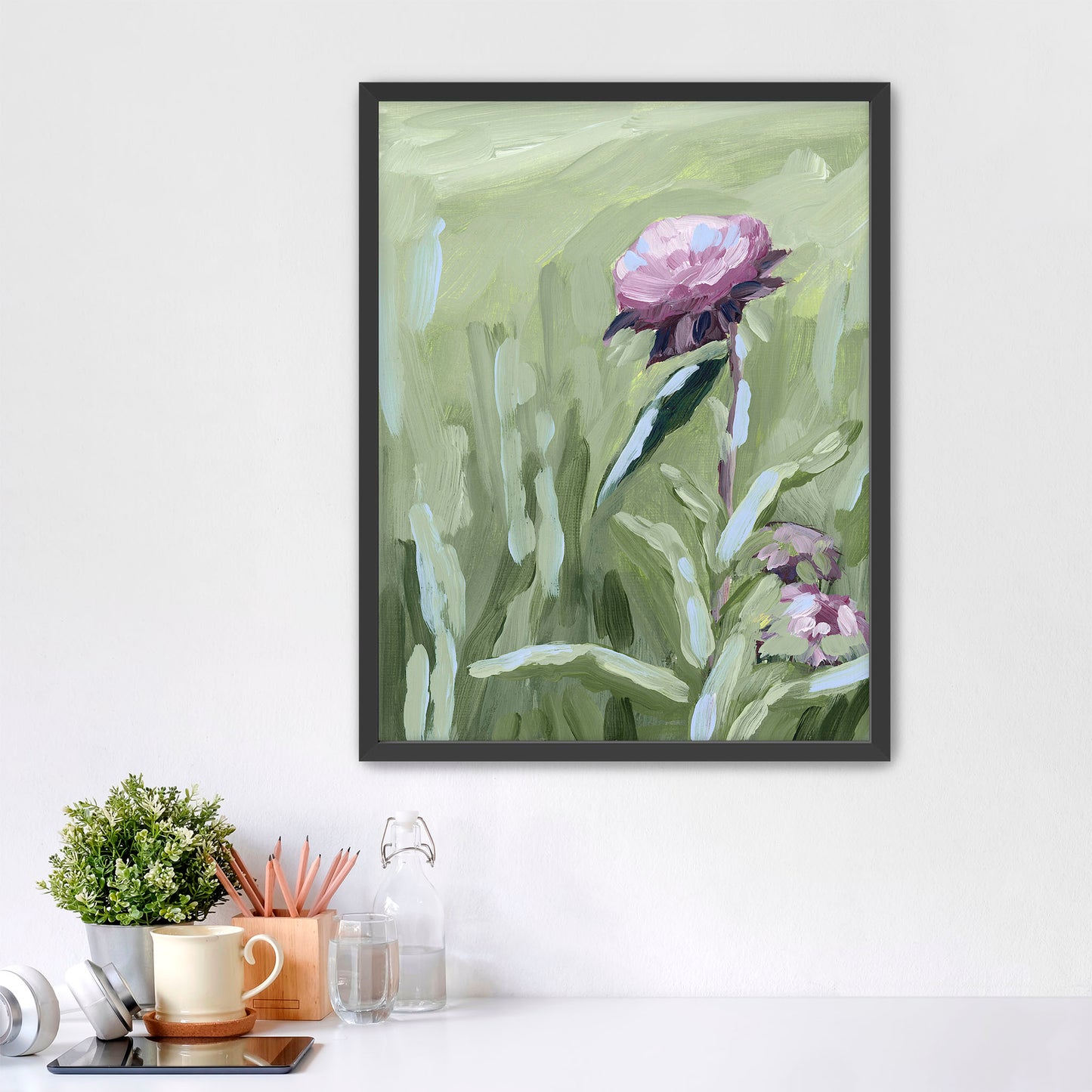 Framed painting of a pink peony flower against a green background.